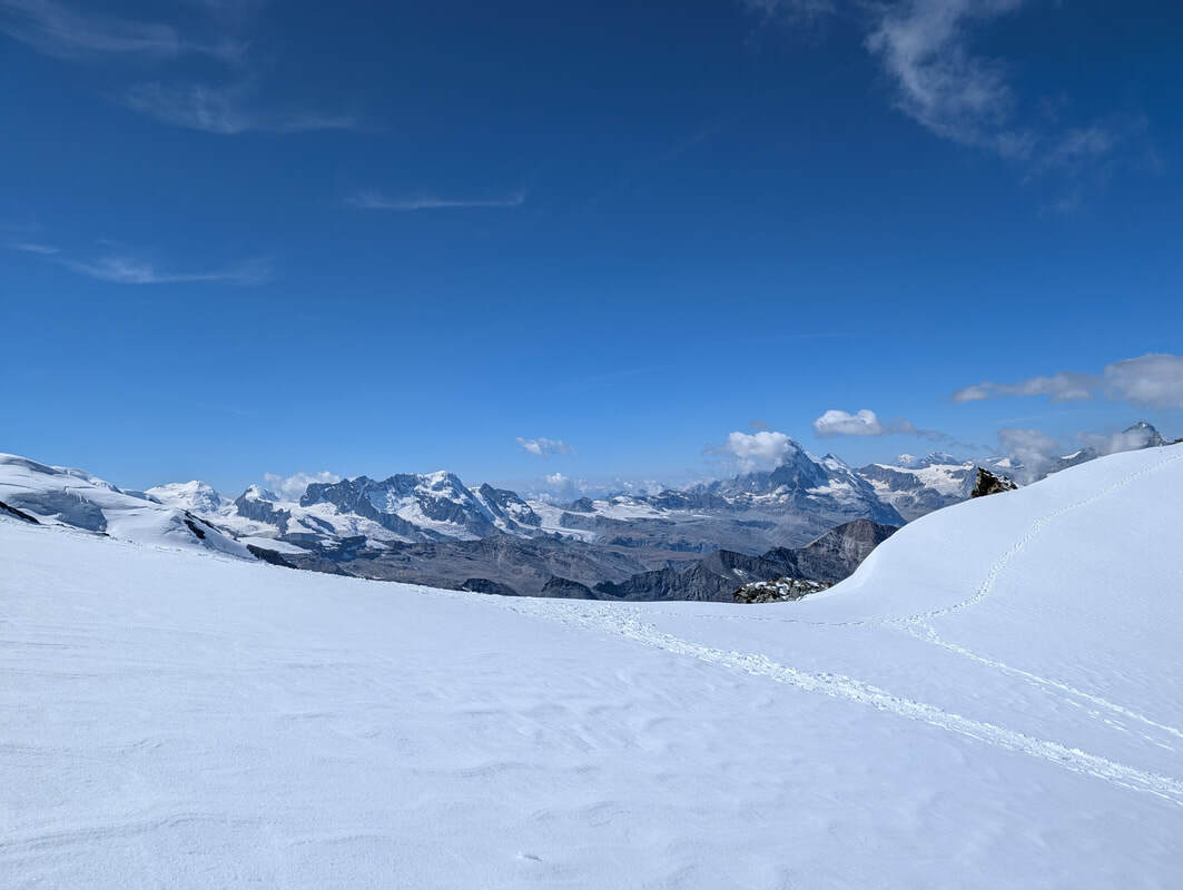 Panorama from the ridge with the Matterhorn and Mont Blanc visible.