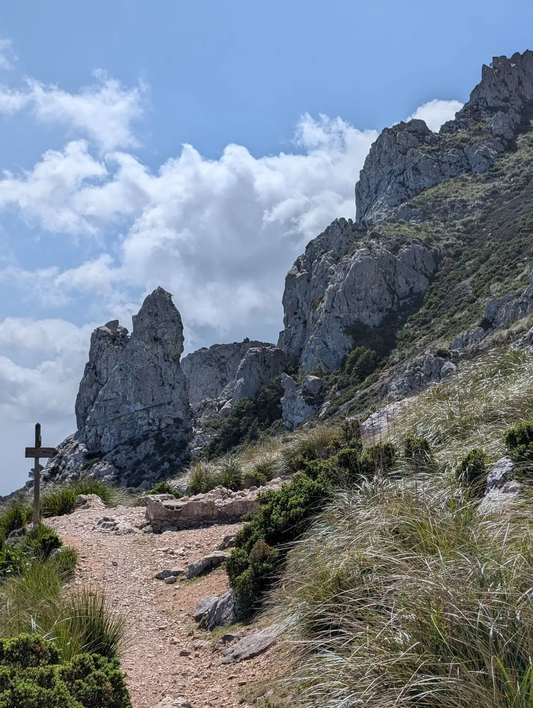 Rock formation with hiking path in front
