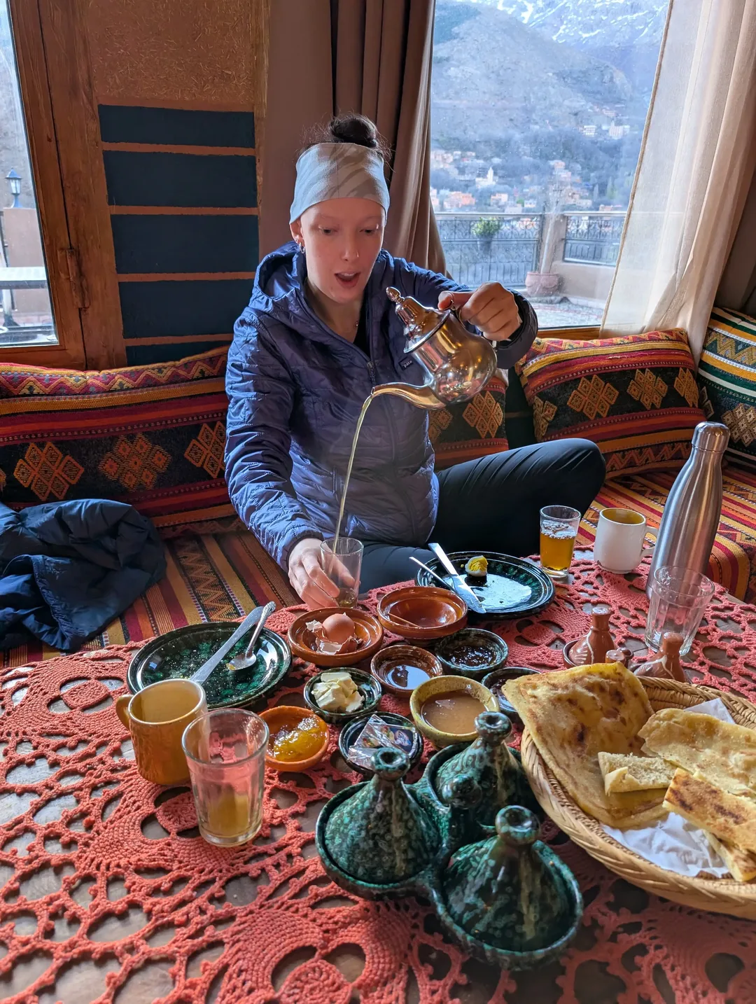 Pouring mint tea from a traditional teapot
