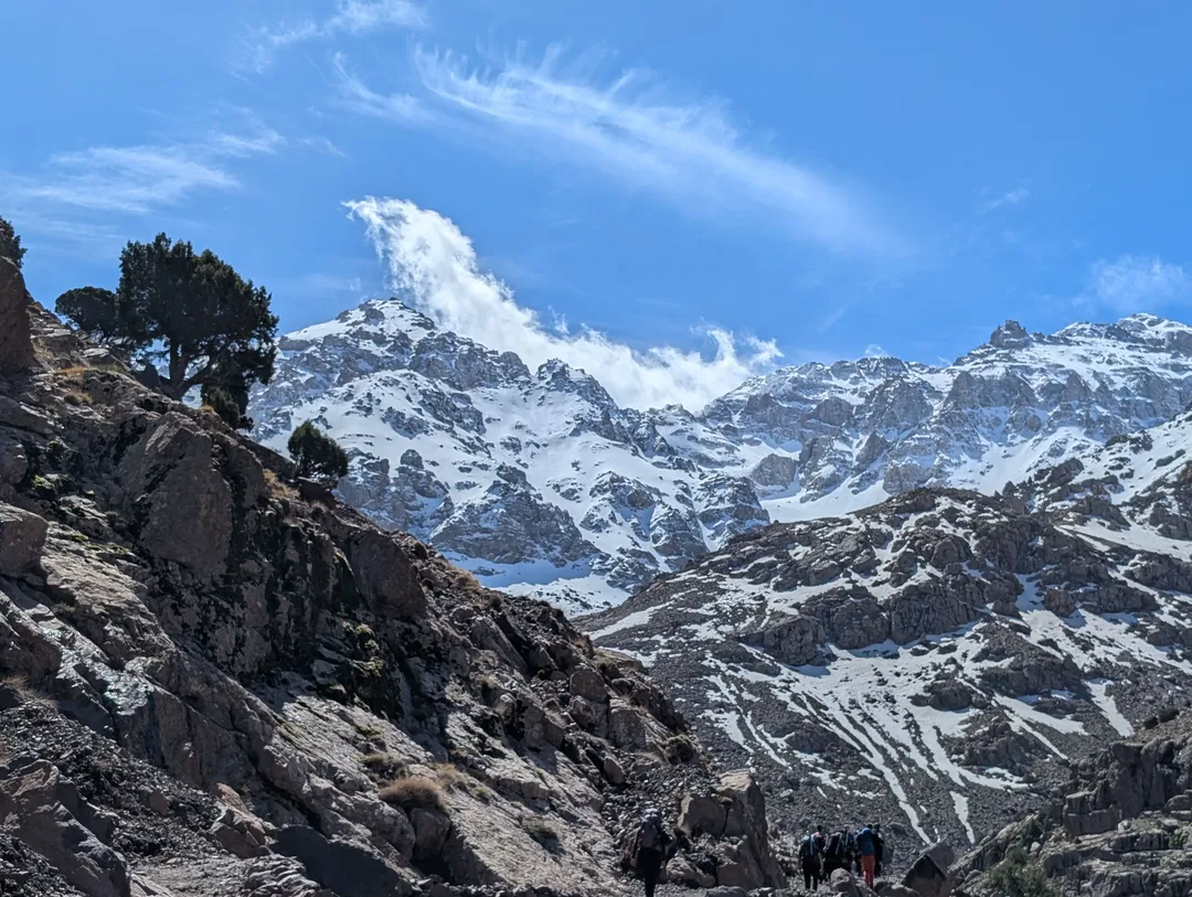 View of the snow-covered Atlas Mountains on the ascent of Mount Toubkal.