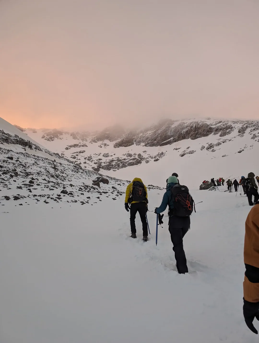 Dense clouds illuminated by the rising sun.