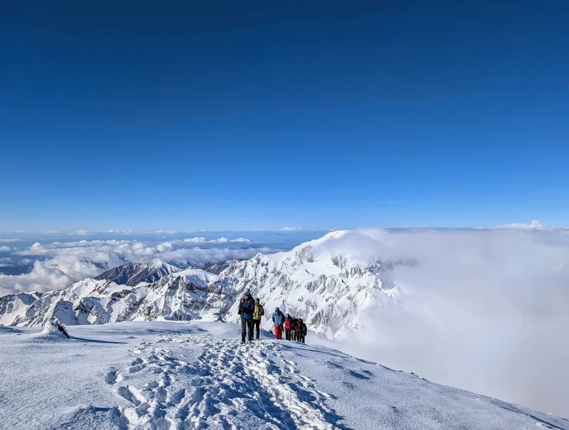Snow covered summit peak